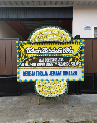 Papan Bunga Duka di Leihitu